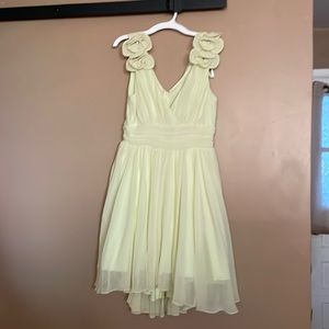 Gently used size 5 dress from Deb worn once it’s a yellow green color